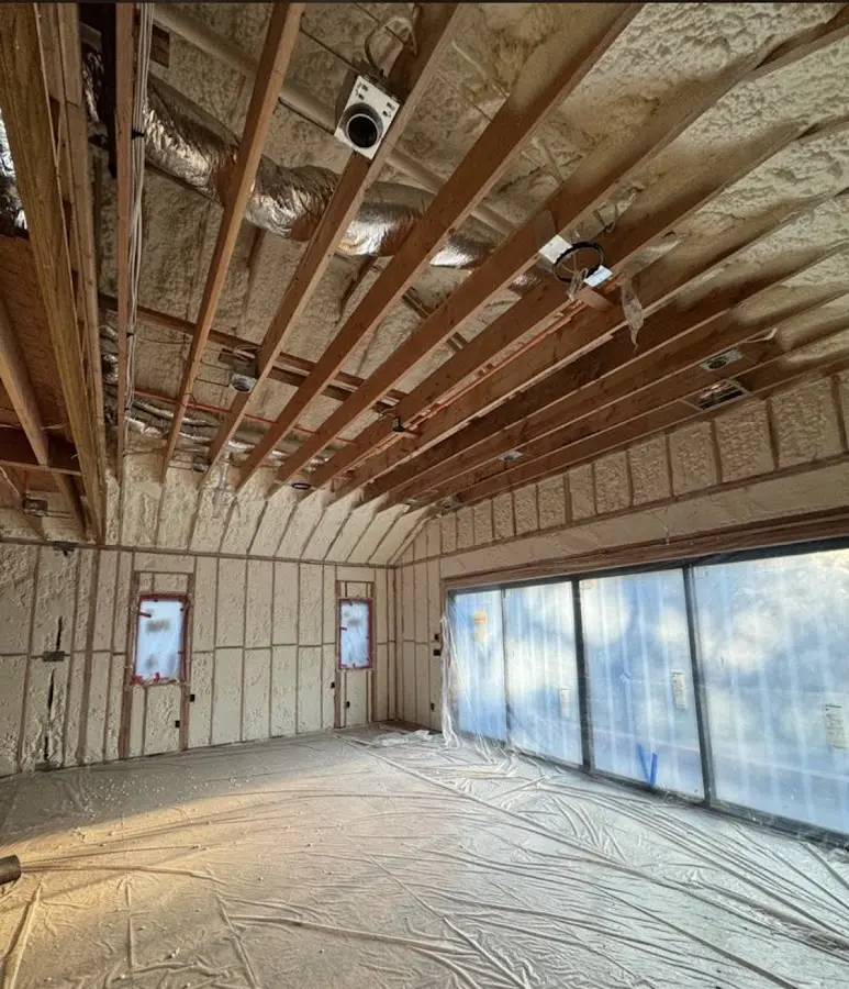 Interior walls and ceiling insulated with spray foam during new construction in Glenpool